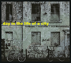 Rob Brown / Daniel Levin / Jacek Mazurkiewicz Day in the life of a city
